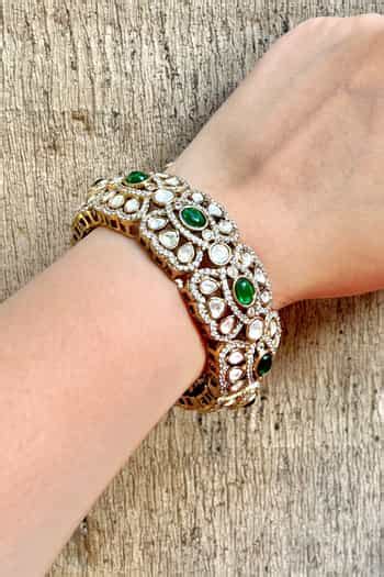 Buy Green Stones, Zari, Diamonds Polki Embellished Cutwork Bangle by ...