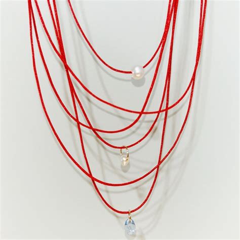 Image result for Red String Designs