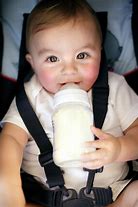 Image result for Baby Drinking Spilling Milk