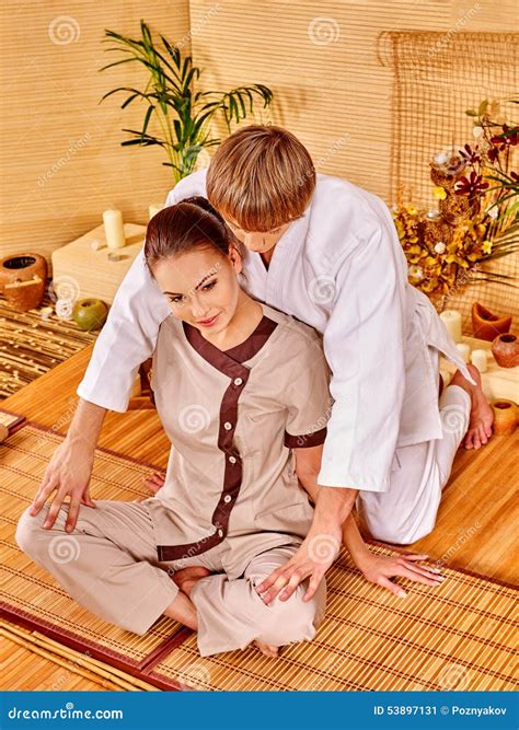 Male Masseur Doing Massage Woman in Bamboo Spa Stock Image - Image of ...