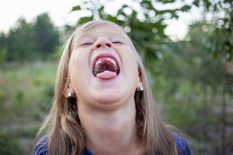 Image result for First Loose Tooth Getting Pulled Out