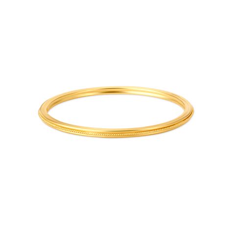 Carved Glossy Gold Bangle