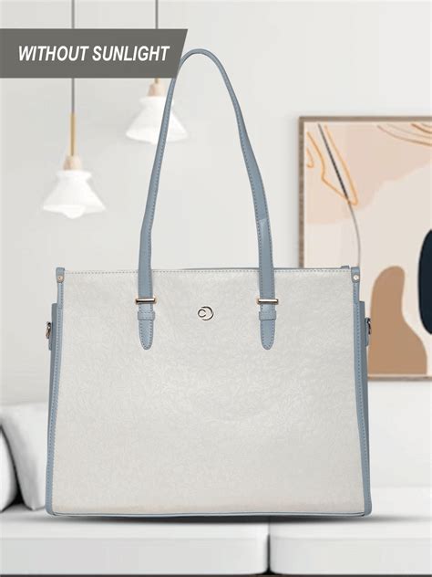 Buy Caprese Aurora Color Changing Laptop Tote Large Blue @ Rs.1499 ...