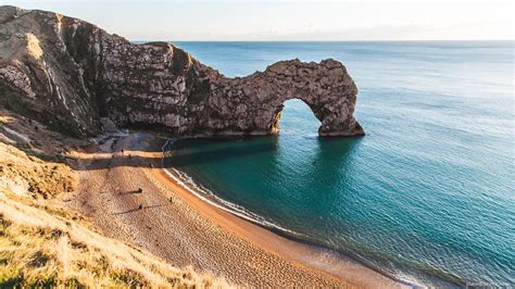 Durdle Door in photos - natural sea arch in England, UK
