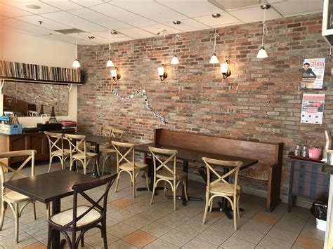 10 Best Patio Lunch In Edmonton - painting of quaint french cafe
