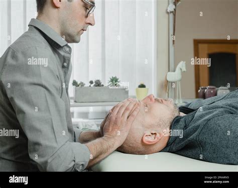 Craniosacral therapy hi-res stock photography and images - Alamy