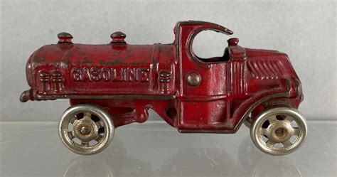 At Auction: Vintage Cast Iron Mack Gasoline Tanker Truck