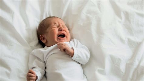 Baby cries in their sleep - common causes and tips