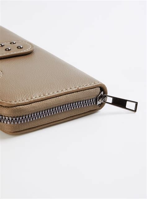 Buy Women Textured Zip Around Wallet Online at just Rs. 599.0 ...