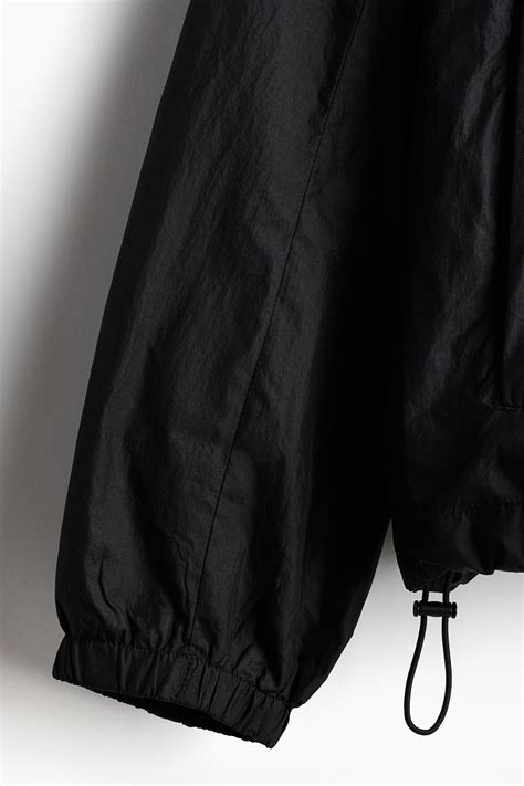 Regular Fit Water-repellent windbreaker - Black - Men | H&M IN