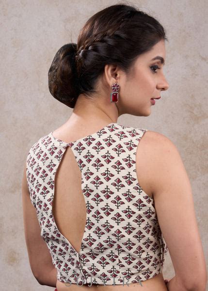 Classy white printed cotton sleeveless blouse – Sujatra