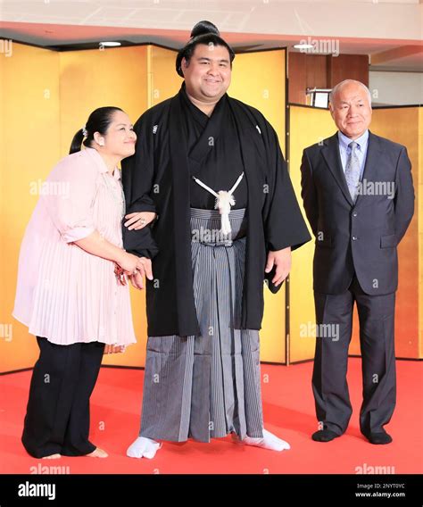 Sumo wrestler Takayasu (C), poses with his parents father Eiji and ...