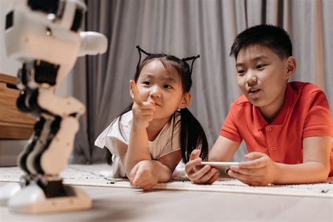 厂家批发9寸智能早教机器人 绘本课本同步视频互动7寸触屏学习机-阿里巴巴