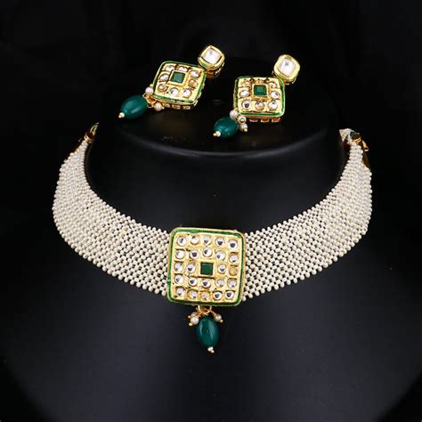 Sukkhi Pretty Eye Catching Kundan Gold Plated Pearl Choker Necklace Se ...
