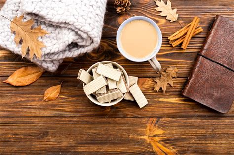 Beautiful coffee and wafers layout on wooden background | Free Photo
