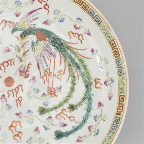 A dragon and phoenix dish with Qianlong six charachtere mark, about ...