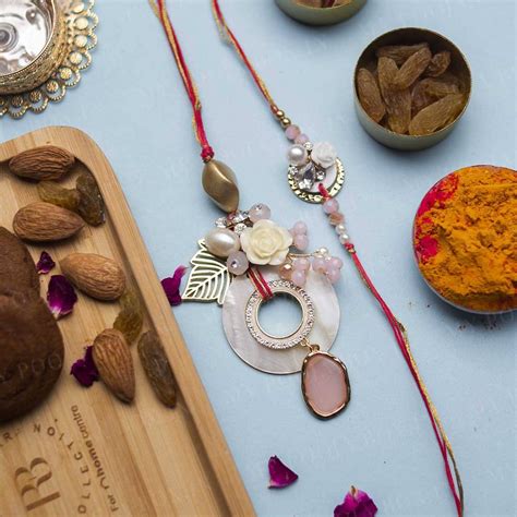 Buy Fascinating Peach Bhaiya Bhabhi Rakhi Online in India - Mypoojabox.in