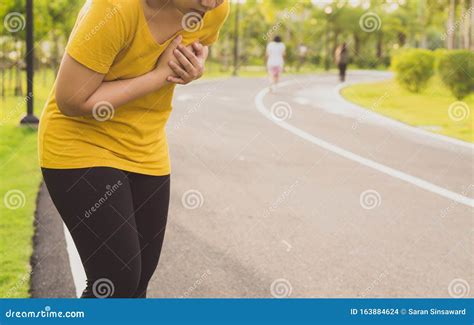 Sport Womanman Having Heart Attack or Chest Pain after Running Workout ...