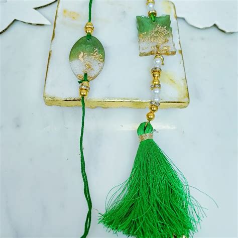 Send Bonded Resin Rakhi Duo Online