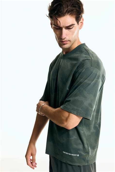 Boxy-style sports T-shirt with DryMove™ - Dark green/Patterned - Men ...