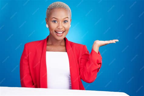 Portrait black woman and hand holding in studio for promo announcement ...