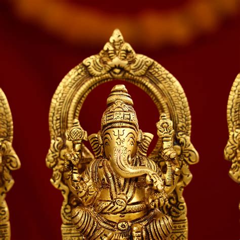 Brass Goddess Lakshmi, Lord Ganesha & Goddess Saraswati Idols Seated on ...
