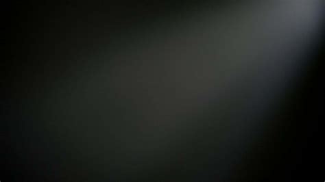 Download Plain Black Desktop With A Light Wallpaper | Wallpapers.com