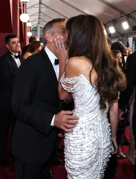 George and Amal Clooney PDA at the 2025 Tony Awards Red Carpet | Us Weekly