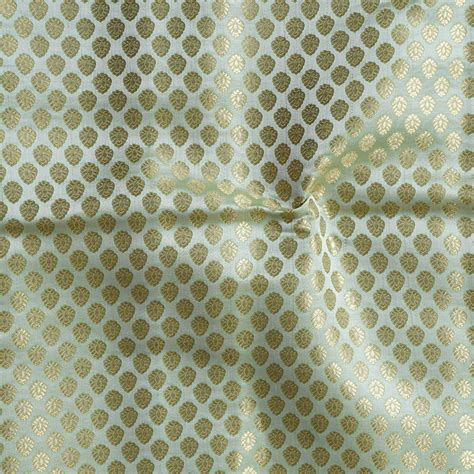 Banarasi Brocade Mint Green With Goldenish Butti Fabric – Sanskruti