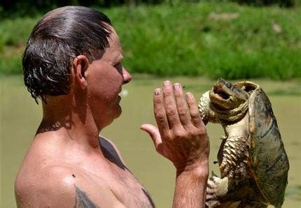 Image result for Man Getting Bit by Snapping Turtle