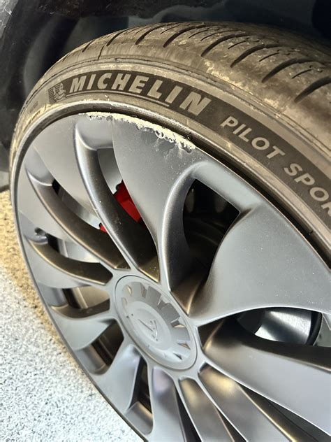 Curb rash - after a year it finally happened in a drive through. Any ideas on how to repair and ...