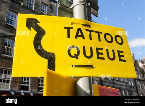 Image result for Queue This Way Sign