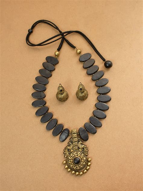 Shyamamayura — Antique Gold and Black Peacock Design Handmade Terracot ...