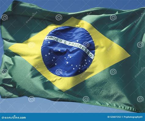 Brazilian flag in the wind stock photo. Image of patriotic - 52687252