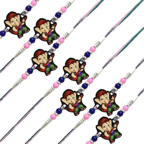 Bal Ganesha with Guitar Rakhi Set of 7 with Roli Chawal and Raksha Ban ...