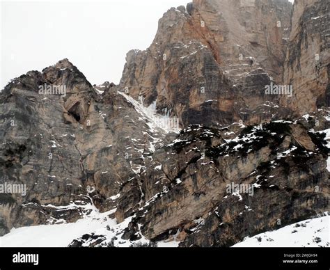 some rock and snow falling on Fanes mountain Dolomites winter panorama ...