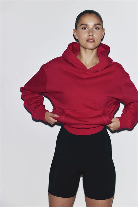 Loose Fit Sports hoodie - Bright red - Ladies | H&M IN