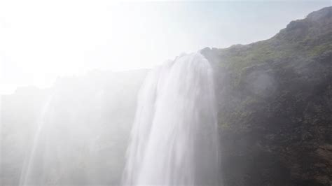 Download wallpaper 3840x2160 waterfall, cliff, sunlight, spray, man 4k ...