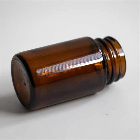 Amber Pharmaceutical Bottle With Silver Cap