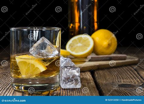 Whiskey with Lemon stock photo. Image of irish, golden - 52313250