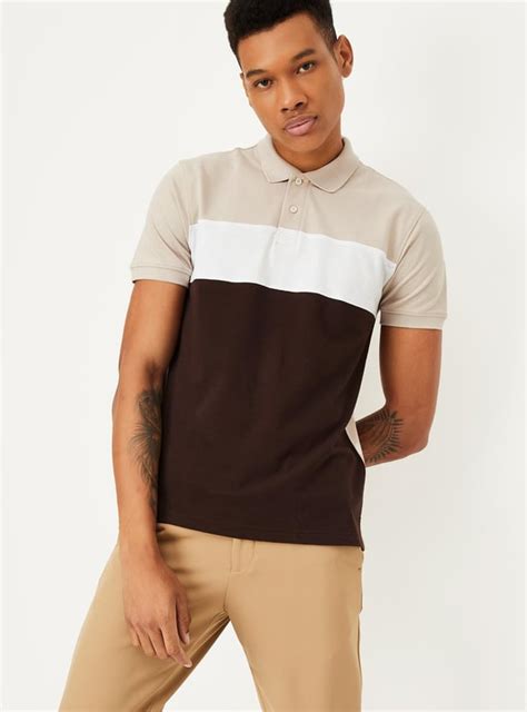Buy Men Slim Fit Colourblocked Polo T-shirt Online at just Rs. 699.0 ...