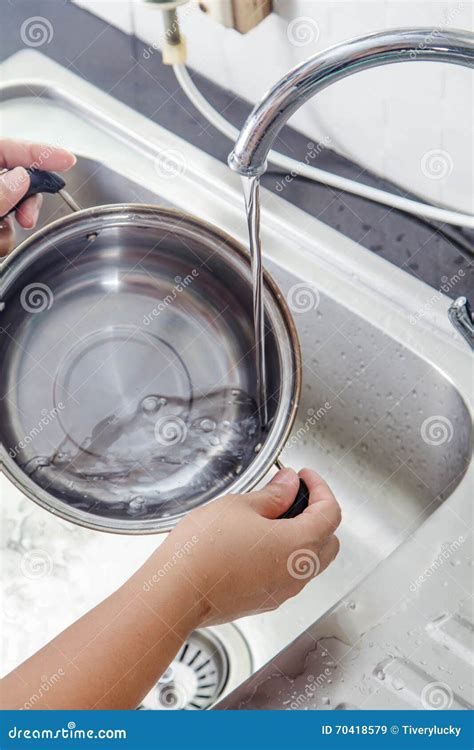 Washing Pans stock image. Image of lifestyle, drain, women - 70418579