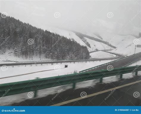 Winding Mountain Roads, Snow-capped Mountains, and Forests Outside the Bus Window Stock Image ...