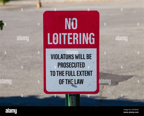 Red and White No Loitering Sign Stock Photo - Alamy