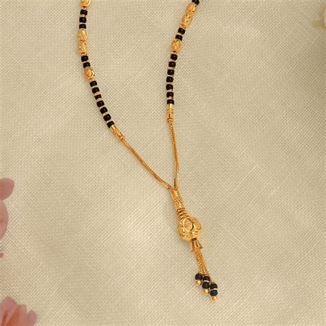 Dazzling Yellow Gold Carved Bead Mangalsutra