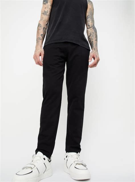 Buy Men Solid Slim Fit Track Pants Online at just Rs. 599.0 ...
