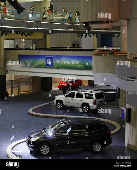 GM cars and trucks are displayed in the motor lobby at the General Motors global headquarters in ...