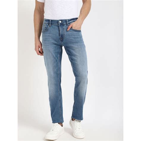 Buy Tommy Hilfiger Men Blue Solid Jeans Online