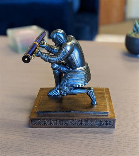 This Bowing Medieval Knight Pen Holder Deserves a Spot On Every Geeks Desk