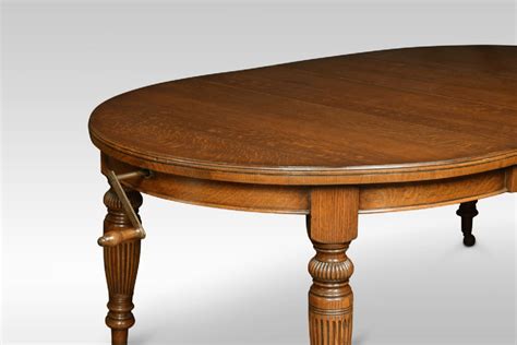 Image result for Oval Extending Dining Table